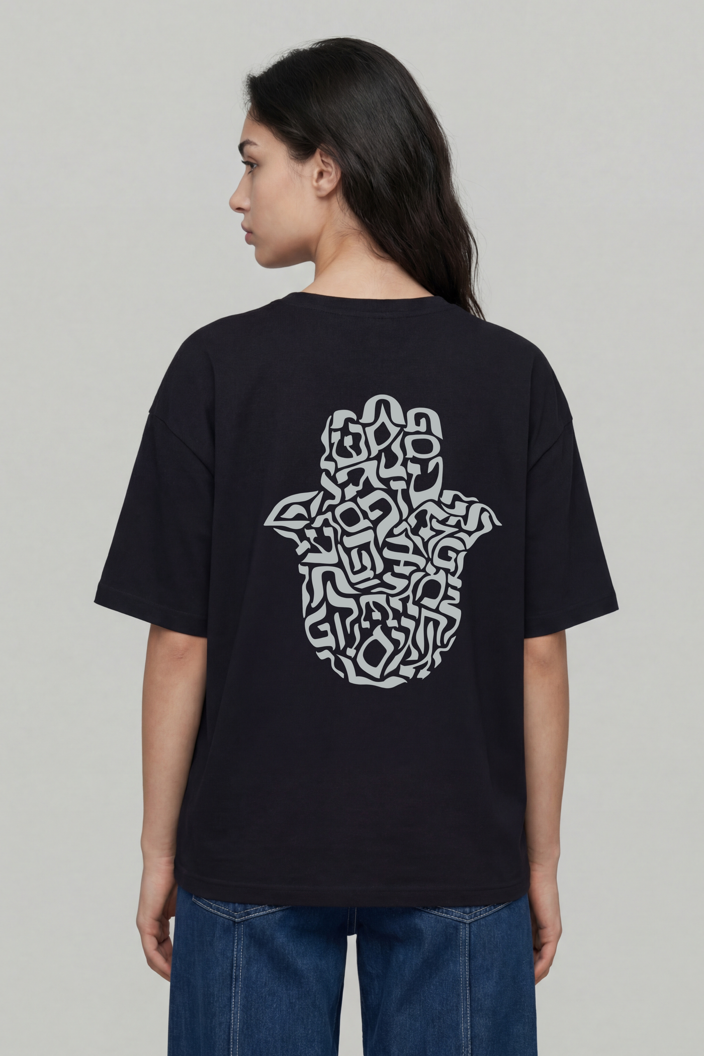 T-shirt with Hamsa Artwork — Women — Haifa Oversize / Back / Black with silver | TEN